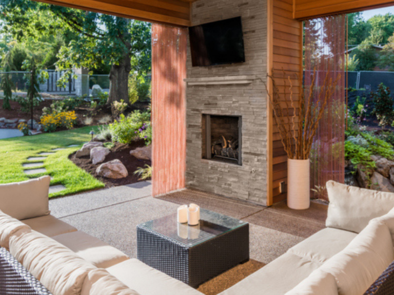 TV above fireplace in outdoor living area TV above fireplace in outdoor living area